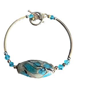 Handmade gold and light blue speckled glass & beaded t-clasp bracelet